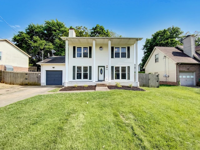 480 Bamburg Dr, Clarksville, TN 37040 - view of front of property featuring an attached garage, concrete driveway, and a chimney