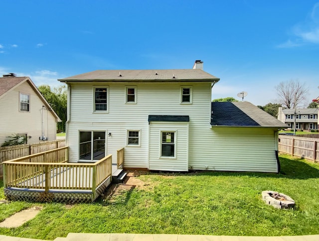 480 Bamburg Dr, Clarksville, TN 37040 - rear view of property with a chimney, a deck, and an outdoor fire pit