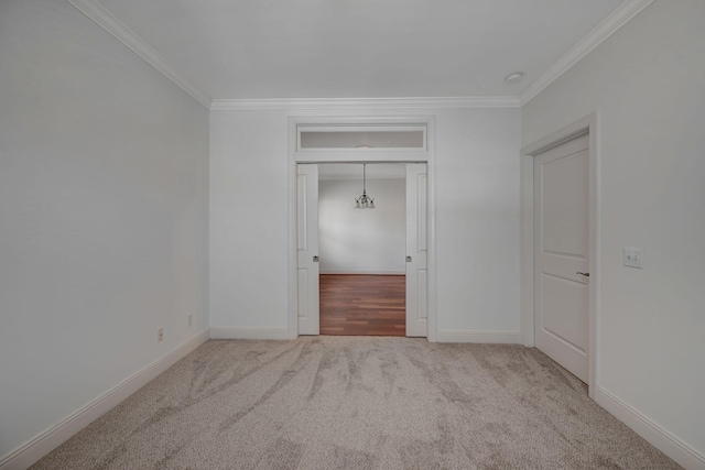 301 Criddle St Unit 304, Nashville, TN 37219 - unfurnished bedroom with ornamental molding and carpet