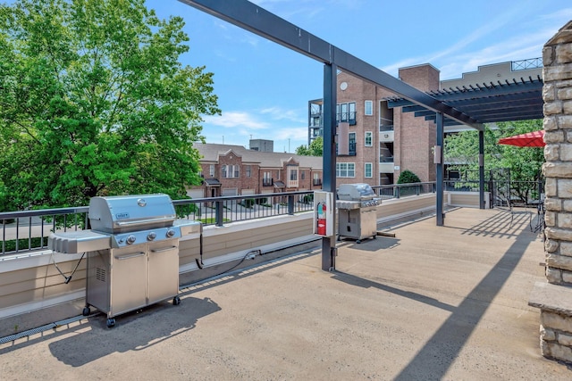 301 Criddle St Unit 304, Nashville, TN 37219 - view of patio featuring area for grilling and a pergola