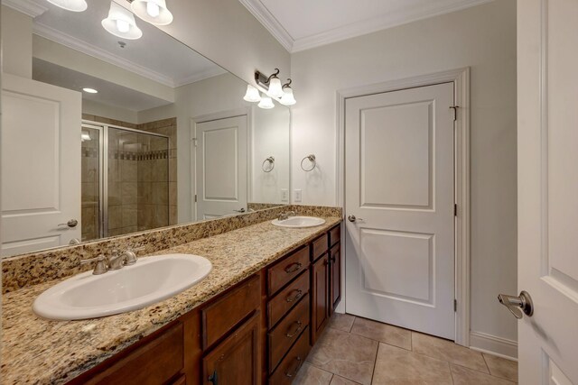 301 Criddle St Unit 304, Nashville, TN 37219 - full bath with double vanity, a stall shower, tile patterned flooring, and crown molding