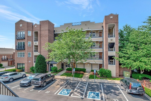 301 Criddle St Unit 304, Nashville, TN 37219 - view of building exterior featuring uncovered parking