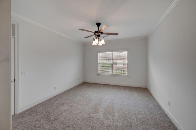 301 Criddle St Unit 304, Nashville, TN 37219 - spare room featuring carpet floors, ornamental molding, and a ceiling fan