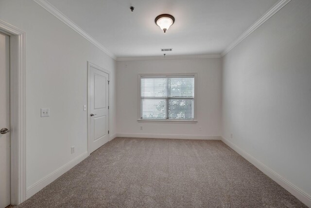 301 Criddle St Unit 304, Nashville, TN 37219 - spare room with light colored carpet, ornamental molding, and fire sprinkler in ceiling