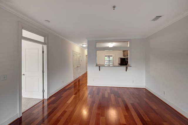 301 Criddle St Unit 304, Nashville, TN 37219 - spare room featuring wood finished floors, ornamental molding, a smoke detector, and fire sprinkler in ceiling