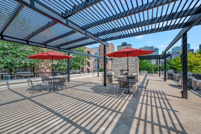 301 Criddle St Unit 304, Nashville, TN 37219 - view of patio / terrace with a pergola, outdoor dining area, and area for grilling
