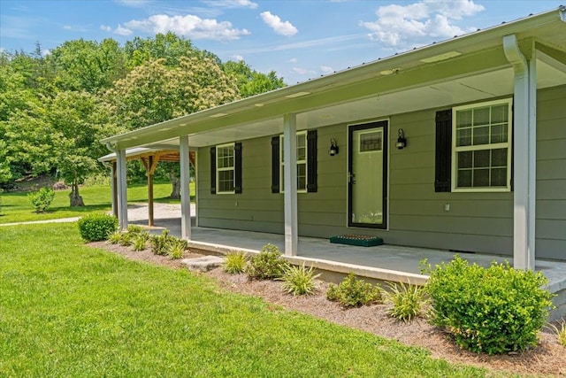 49 Je Sartain Rd, Manchester, TN 37355 - doorway to property with a porch and a yard