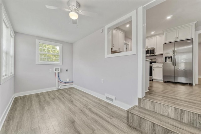 49 Je Sartain Rd, Manchester, TN 37355 - laundry room with light wood-type flooring, a ceiling fan, and recessed lighting