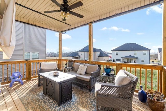 1148 Folly Beach Dr, Clarksville, TN 37042 - wooden deck with a ceiling fan, a residential view, and an outdoor living space