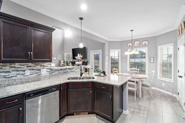 1148 Folly Beach Dr, Clarksville, TN 37042 - kitchen featuring stainless steel dishwasher, a peninsula, dark brown cabinetry, light stone countertops, and crown molding