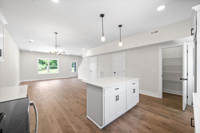 198 Cave St Unit C, Clarksville, TN 37042 - kitchen with stainless steel range with electric cooktop, a chandelier, hanging light fixtures, wood finished floors, and recessed lighting