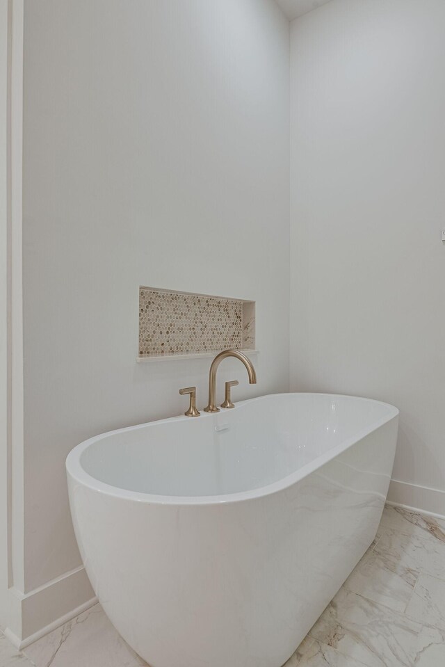 117 Shadow Springs Dr Unit 117, Brentwood, TN 37027 - full bath with marble finish floors and a freestanding tub