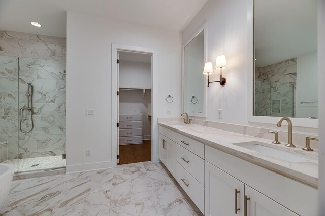 117 Shadow Springs Dr Unit 117, Brentwood, TN 37027 - full bath featuring a marble finish shower, double vanity, marble finish flooring, a spacious closet, and recessed lighting