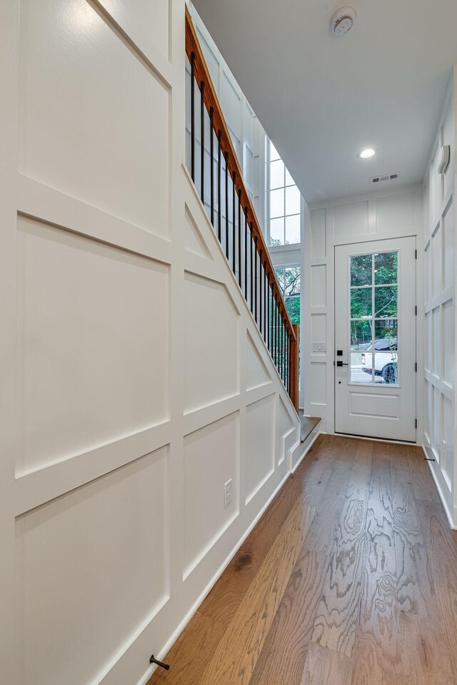117 Shadow Springs Dr Unit 117, Brentwood, TN 37027 - doorway to outside featuring wood finished floors, stairway, and recessed lighting