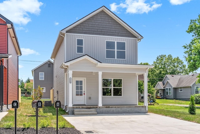 198 Cave St Unit A, Clarksville, TN 37042 - view of front facade with board and batten siding, a porch, and a front yard
