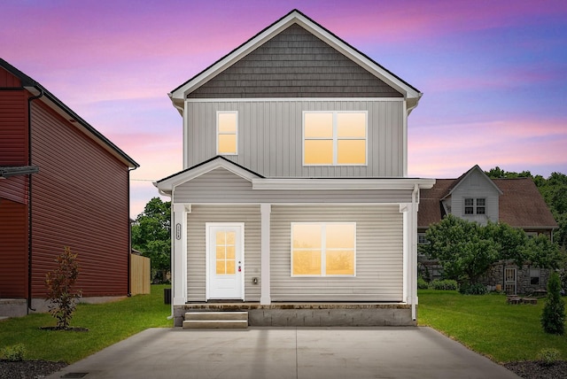 198 Cave St Unit A, Clarksville, TN 37042 - view of front facade featuring a front yard, board and batten siding, and covered porch