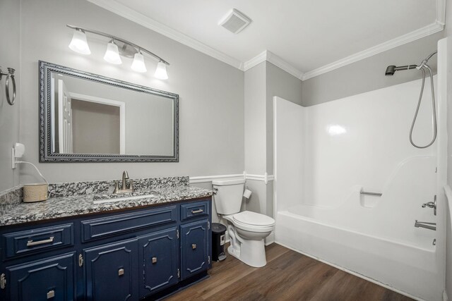 229 Wellington Way, Smyrna, TN 37167 - bathroom featuring vanity, crown molding, wood finished floors, and tub / shower combination
