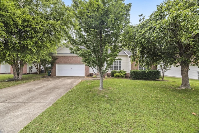 2135 Loudenslager Dr, Thompsons Station, TN 37179 - view of property hidden behind natural elements with brick siding, driveway, and a front lawn