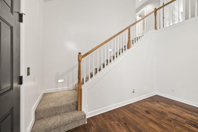 2135 Loudenslager Dr, Thompsons Station, TN 37179 - staircase with wood finished floors and a towering ceiling