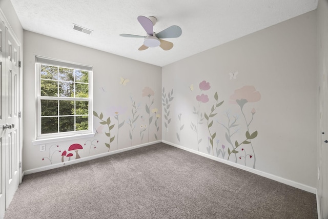 2135 Loudenslager Dr, Thompsons Station, TN 37179 - carpeted spare room with a ceiling fan and a textured ceiling