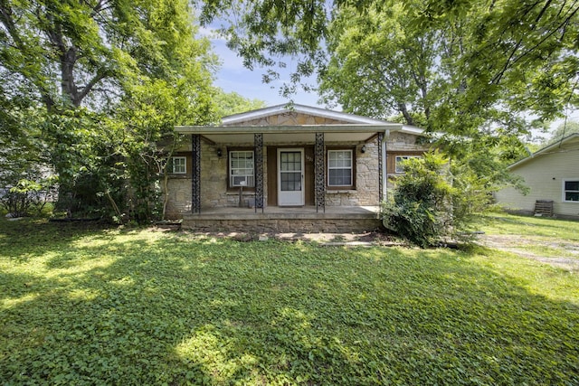 1421 Mohawk Trl, Madison, TN 37115 - view of front of home with stone siding, covered porch, and a front yard