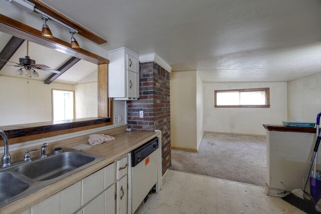 1421 Mohawk Trl, Madison, TN 37115 - kitchen featuring white dishwasher, light floors, white cabinets, light countertops, and light carpet