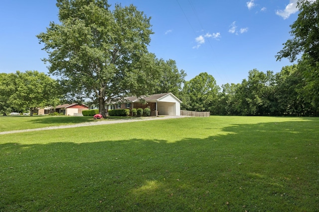 1651 Caughran Rd, Lewisburg, TN 37091 - view of grassy yard with a carport