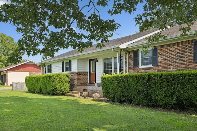 1651 Caughran Rd, Lewisburg, TN 37091 - ranch-style house featuring a front yard and brick siding