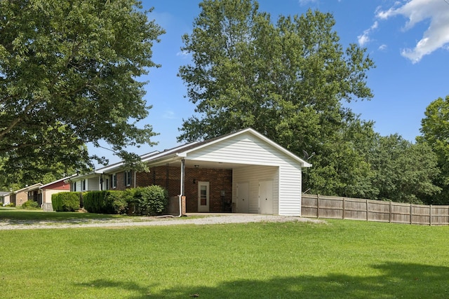 1651 Caughran Rd, Lewisburg, TN 37091 - view of front of house with brick siding and an attached carport