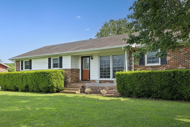 1651 Caughran Rd, Lewisburg, TN 37091 - ranch-style house featuring brick siding and a front yard