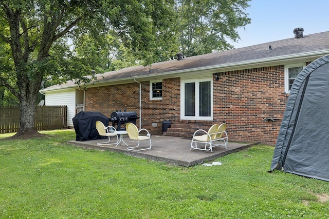 1651 Caughran Rd, Lewisburg, TN 37091 - rear view of house with a patio and brick siding