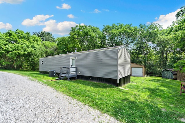 2113 Culleoka Hwy, Culleoka, TN 38451 - view of shed featuring view of wooded area