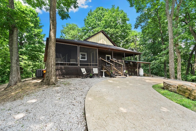 2113 Culleoka Hwy, Culleoka, TN 38451 - view of front of property with a sunroom and driveway