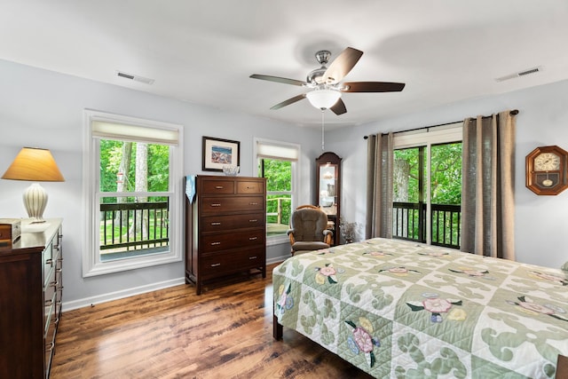 2113 Culleoka Hwy, Culleoka, TN 38451 - bedroom featuring access to exterior, wood finished floors, and a ceiling fan