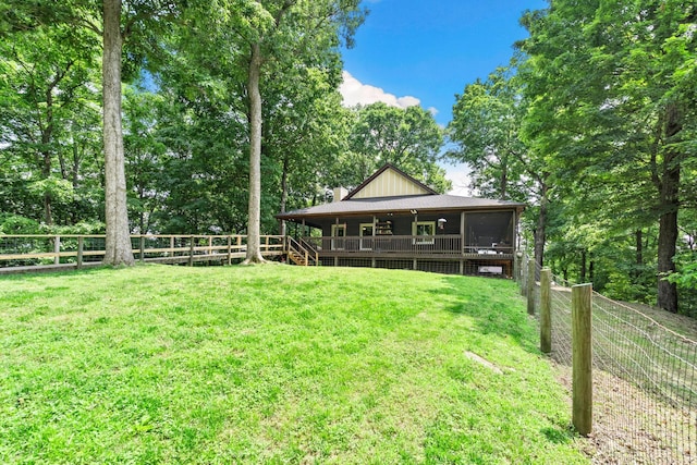 2113 Culleoka Hwy, Culleoka, TN 38451 - rear view of property with a fenced backyard, a sunroom, and a deck