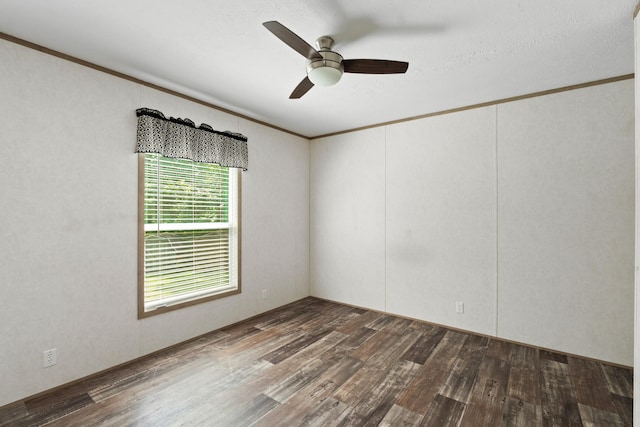 2113 Culleoka Hwy, Culleoka, TN 38451 - unfurnished room featuring dark wood-style floors, crown molding, and a ceiling fan