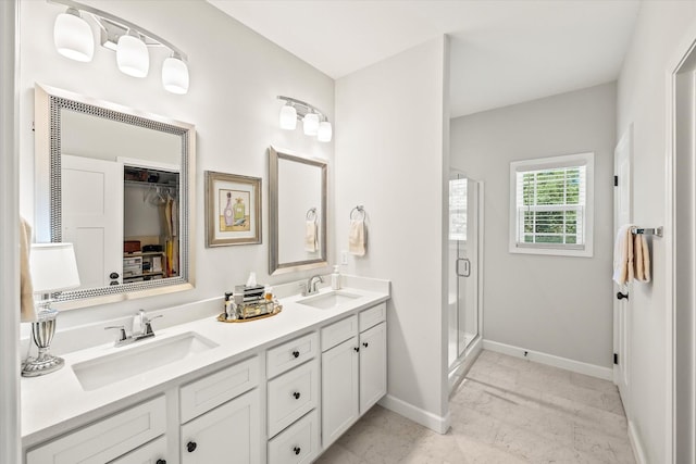 1425 Village Loop, Cookeville, TN 38501 - bathroom with a shower stall, double vanity, and a spacious closet
