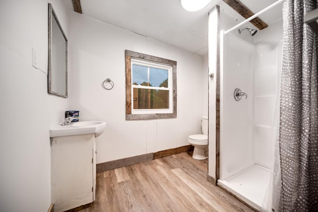 3037 Tunnel Rd, Westmoreland, TN 37186 - bathroom featuring wood finished floors, vanity, and a stall shower