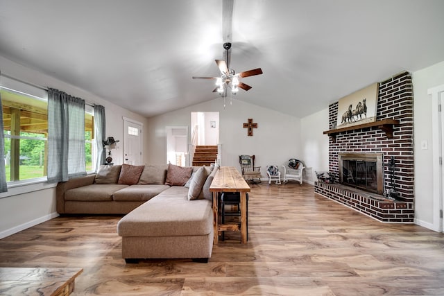 3037 Tunnel Rd, Westmoreland, TN 37186 - living area featuring ceiling fan, wood finished floors, vaulted ceiling, and a fireplace