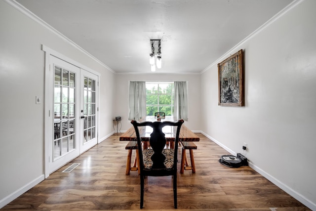 3037 Tunnel Rd, Westmoreland, TN 37186 - dining space with french doors, ornamental molding, and wood finished floors