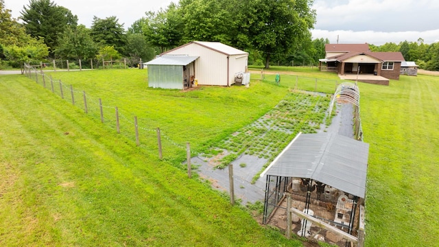 3037 Tunnel Rd, Westmoreland, TN 37186 - view of yard with an outdoor structure, a pole building, and a rural view