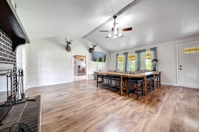 3037 Tunnel Rd, Westmoreland, TN 37186 - dining space featuring wood finished floors, vaulted ceiling, and ceiling fan