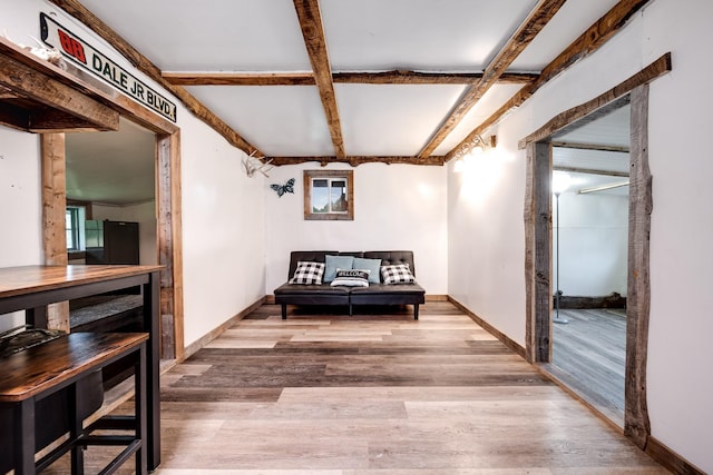 3037 Tunnel Rd, Westmoreland, TN 37186 - hallway featuring light wood-style floors, beam ceiling, and coffered ceiling