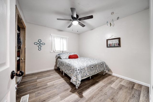 3037 Tunnel Rd, Westmoreland, TN 37186 - bedroom with wood finished floors and a ceiling fan
