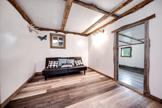 3037 Tunnel Rd, Westmoreland, TN 37186 - living area with wood finished floors and beamed ceiling