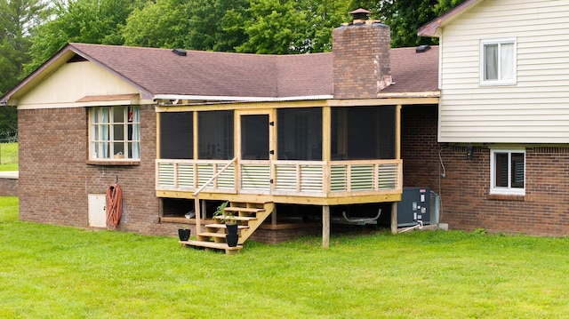 3037 Tunnel Rd, Westmoreland, TN 37186 - back of property featuring brick siding, a chimney, and a lawn