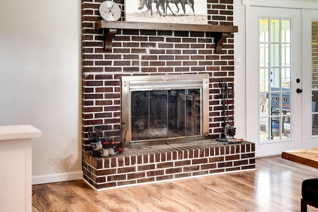 3037 Tunnel Rd, Westmoreland, TN 37186 - detailed view of wood finished floors and a brick fireplace
