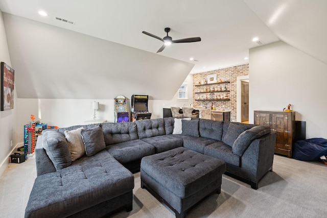 1485 Harrison Rd, Murfreesboro, TN 37128 - living room with light colored carpet, vaulted ceiling, brick wall, ceiling fan, and bar area