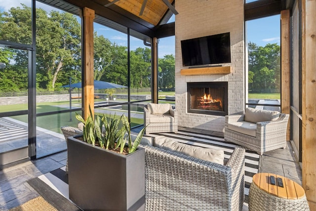 1485 Harrison Rd, Murfreesboro, TN 37128 - sunroom / solarium with view of scattered trees and an outdoor living space with a fireplace