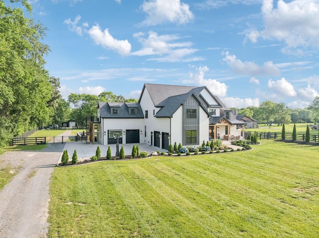 1485 Harrison Rd, Murfreesboro, TN 37128 - modern farmhouse style home featuring dirt driveway, a garage, and stucco siding